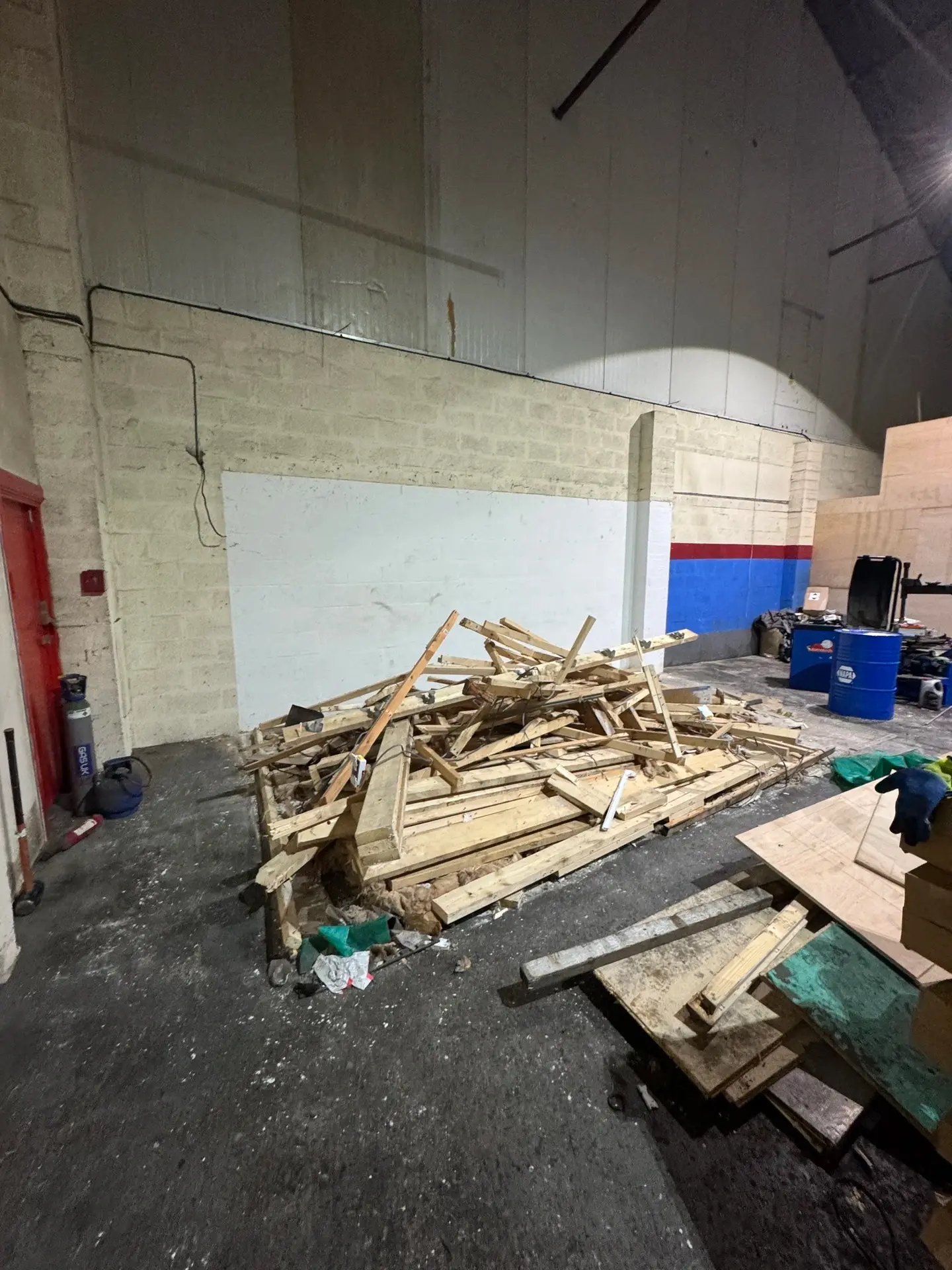 Before: Commercial strip-out. Timber removed and the unit floor cleared